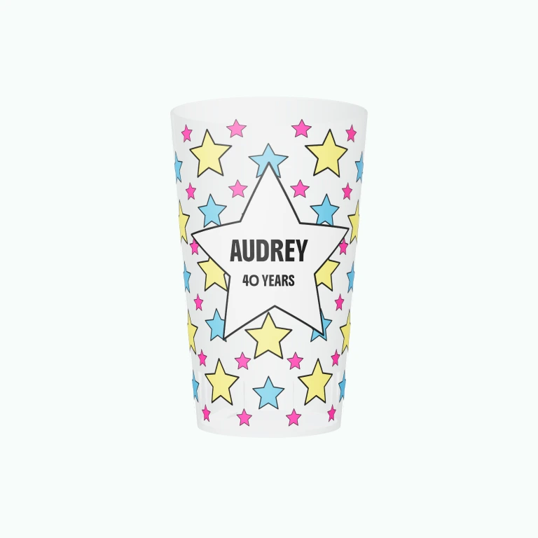 Blue and yellow birthday stars design on a cup